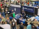 The busy 2022 SEA-PAC exhibit hall and ARRL booth. [David Minster, NA2AA, photo]